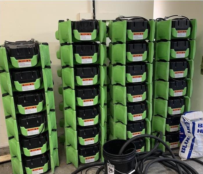 SERVPRO water damage equipment stacked 